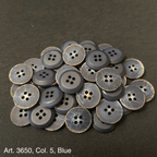 Blue buttons for shirts and blouses with a classic four-hole design, ideal for sewing projects