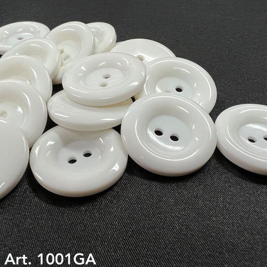 White round craft buttons with two holes from Buttonology Inc to buy craft buttons