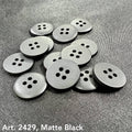 Matte black sewing buttons with four holes from Buttonology Inc to buy sewing buttons online