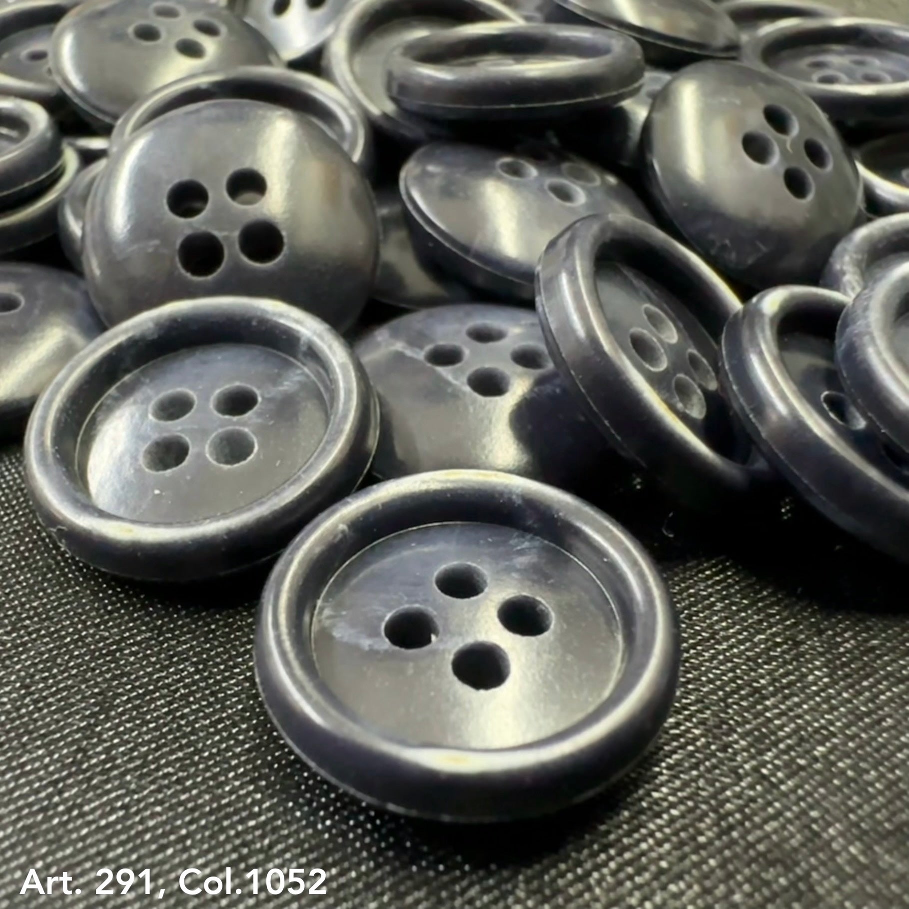 Coat buttons for sewing in dark navy with four holes, perfect for crafting and garment repairs
