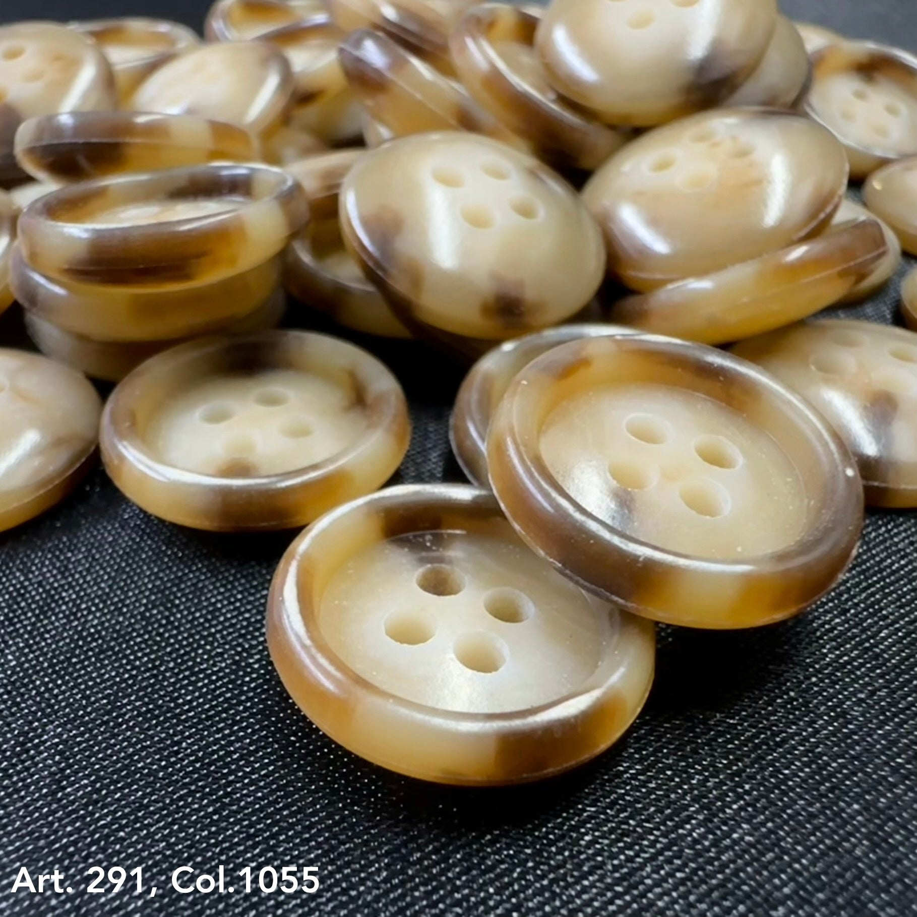 Collection of brown coat buttons for sewing with four holes, ideal for crafting projects