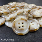 Assorted coat buttons for sewing in cream and brown with four holes, ideal for garment projects.