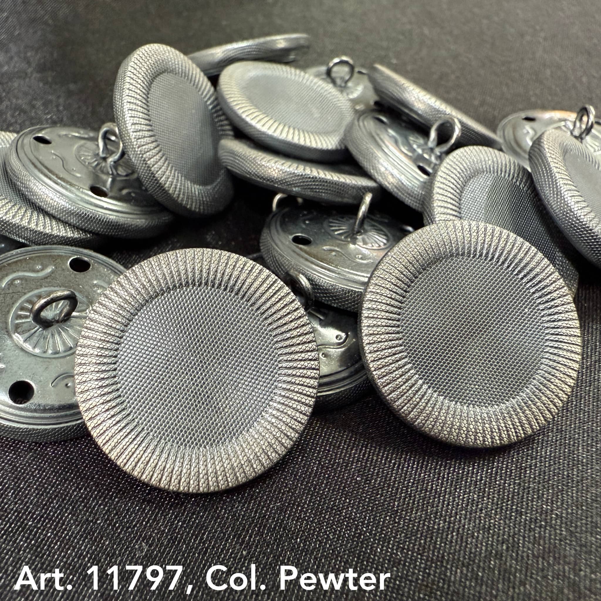 Decorative sewing buttons for coats in pewter color with textured rim by Buttonology Inc.