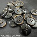 Eco-friendly horn buttons from Buttonology Inc with a black and brown finish and four holes