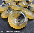 High-quality garment buttons in yellow and black, featuring a smooth finish and four holes for easy sewing
