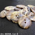 Assorted 2-hole garment buttons in marbled design for sewing and crafting projects