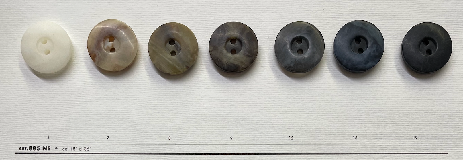 Set of 2-hole garment buttons in various colors and sizes for sewing projects