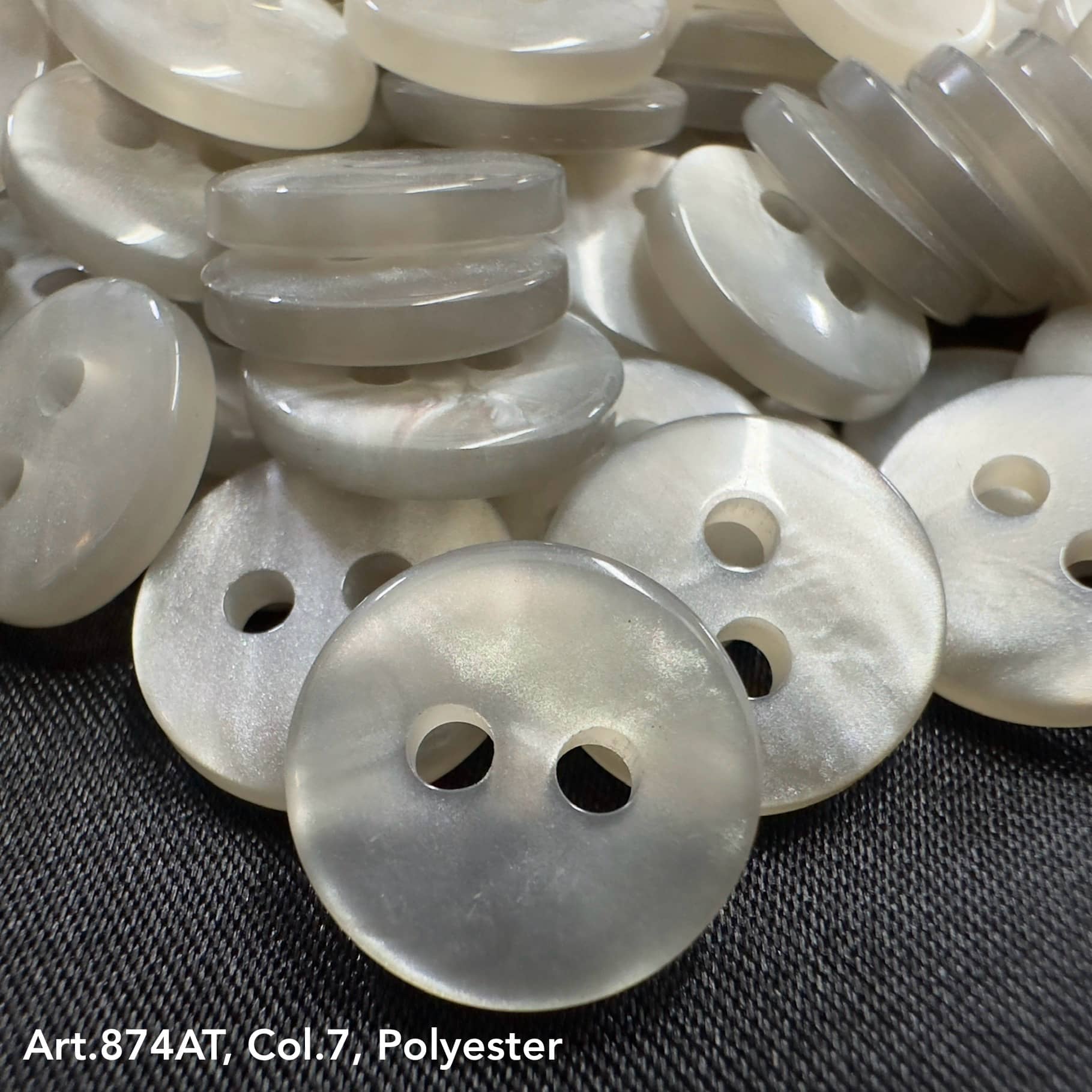 Bulk 2-hole garment buttons in pearlescent finish by Buttonology Inc.