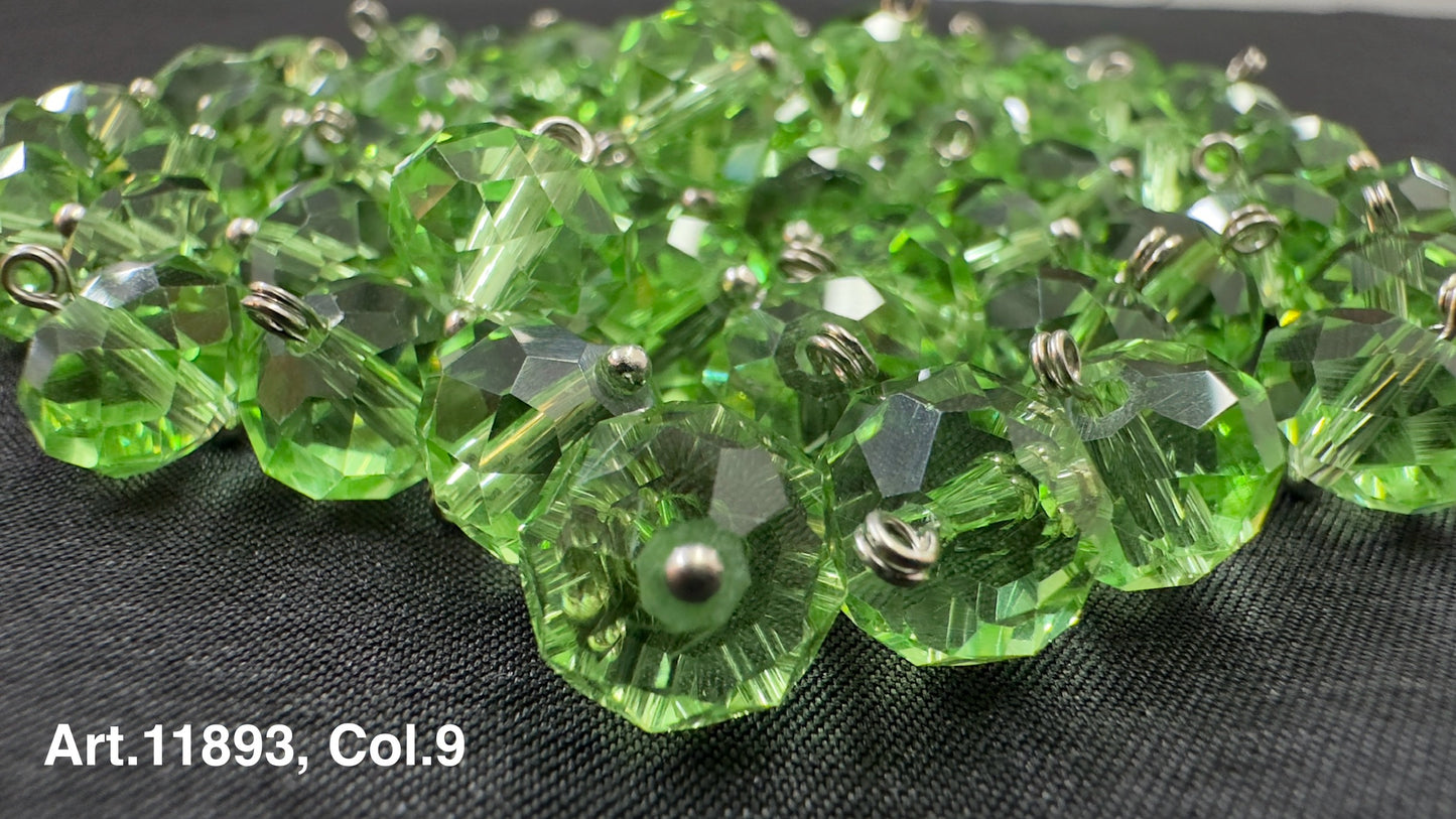 Lot of green glass buttons for sewing with a faceted design and metal loops for attachment