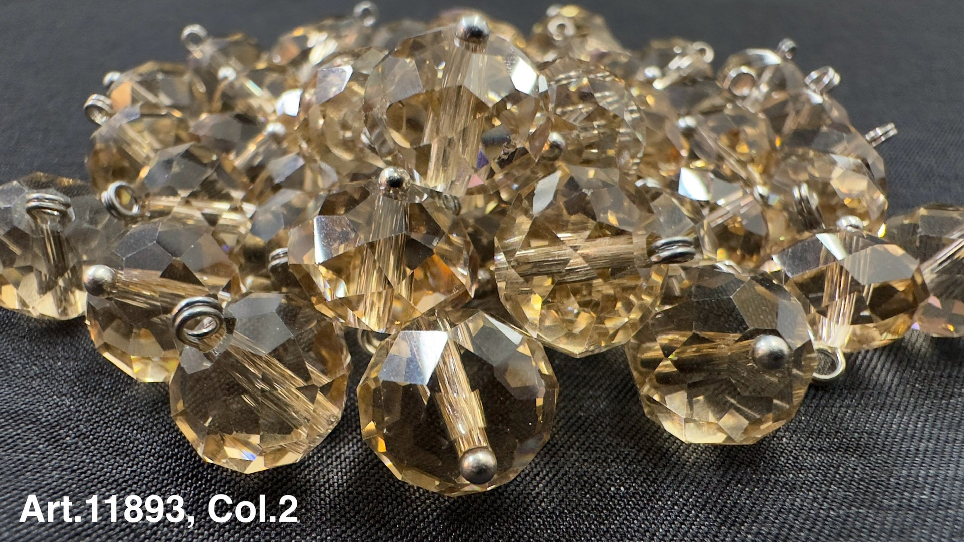 Collection of glass buttons for sewing in various sizes and shapes with a sparkling finish