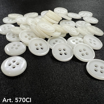 High-quality sewing buttons in white with four holes from Buttonology Inc on black fabric