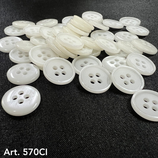 High-quality sewing buttons in white with four holes from Buttonology Inc on black fabric