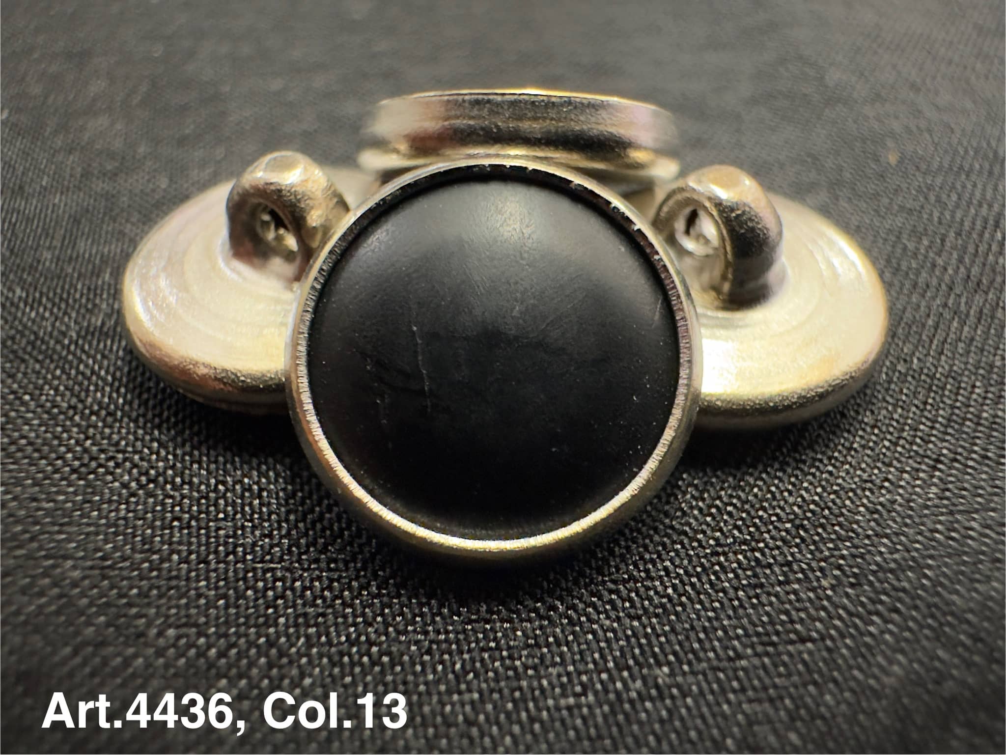 Horn shank button for coats with black center and silver metal shank from Buttonology Inc