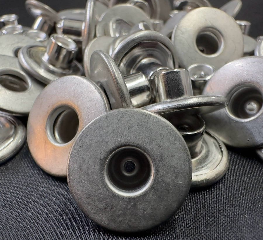 Metal and leather buttons, jean tacks and rivets