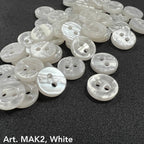 Buttonology Inc white pearlescent 2-hole plastic buttons for DIY projects on dark fabric