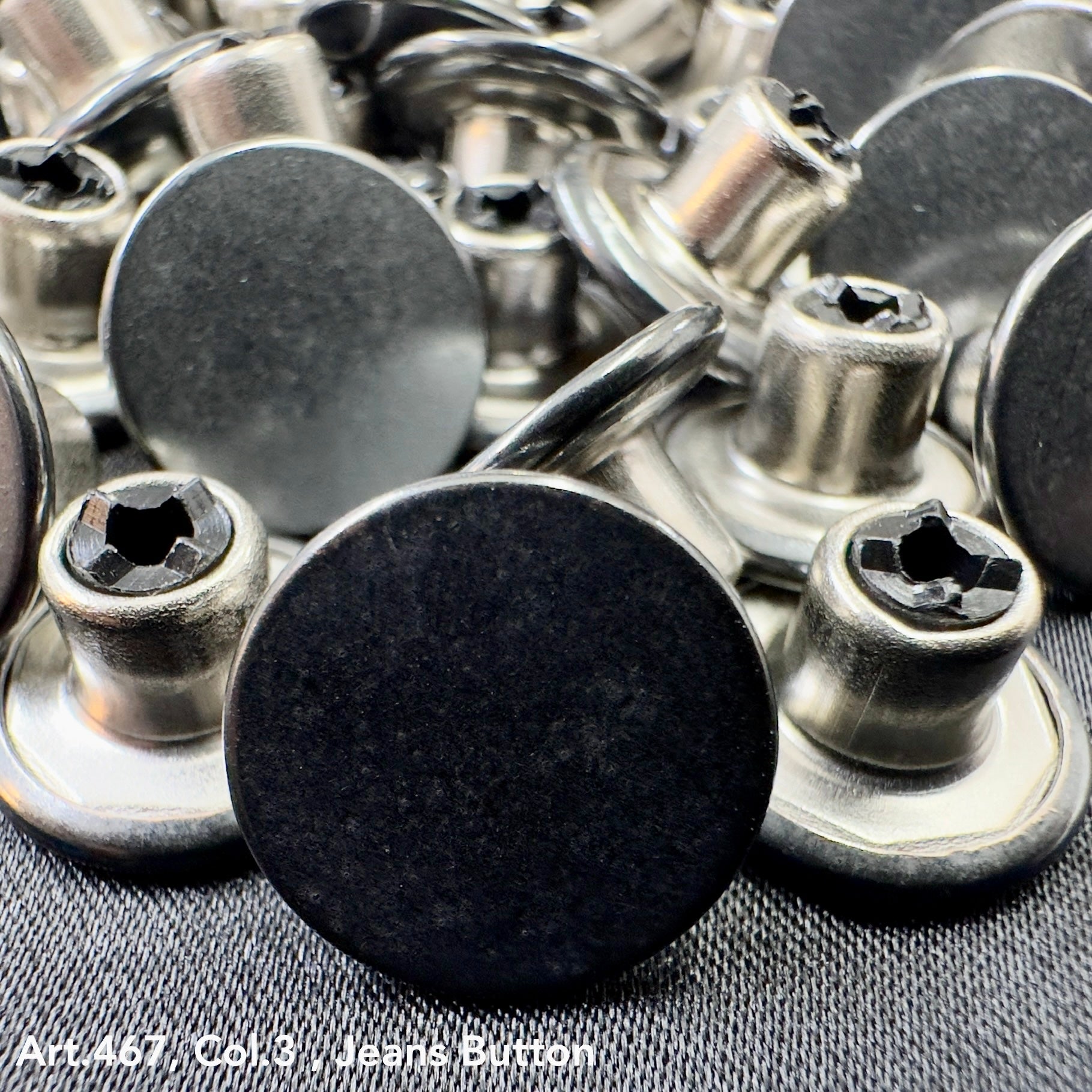 Collection of metal jean buttons for sewing with a shiny finish and durable design