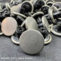 Collection of metal jeans buttons for sewing in various styles and finishes from Buttonology Inc.
