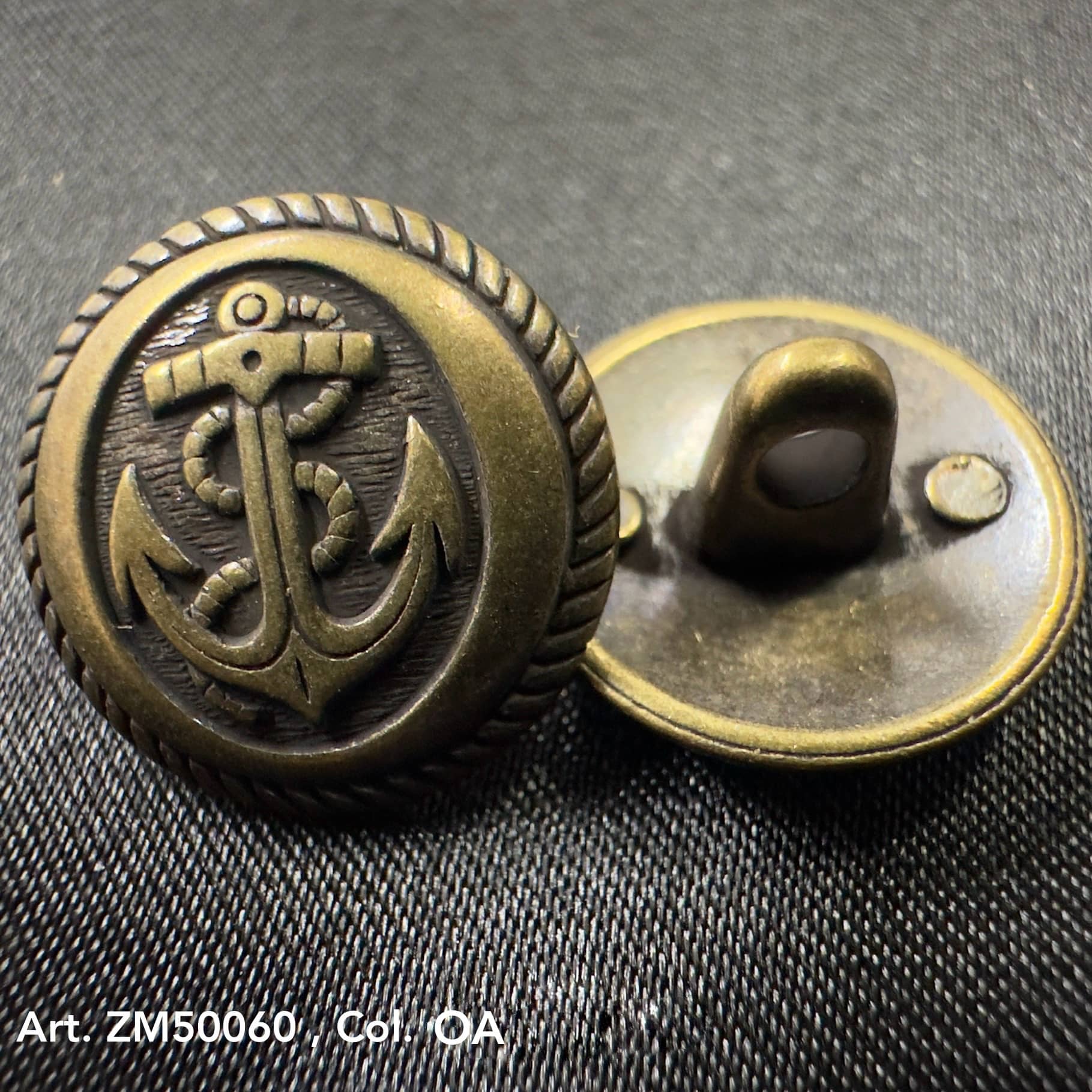 Nautical gold buttons by Buttonology Inc featuring an anchor design with rope detail