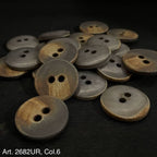Buttonology Inc premium 2 hole sewing buttons with a rustic brown and gray finish on black background