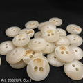 Premium 2 hole sewing buttons in creamy white with a subtle wood texture by Buttonology Inc.
