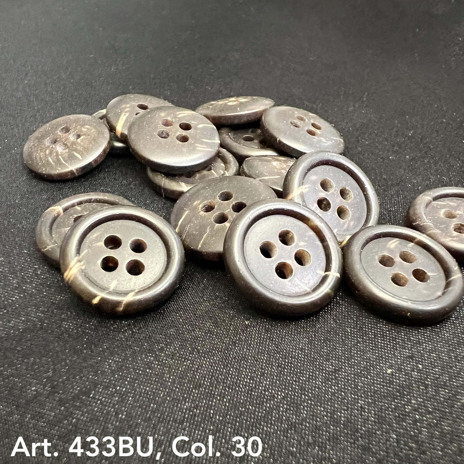 Premium 4-hole sewing buttons in brown featuring a glossy finish and intricate design