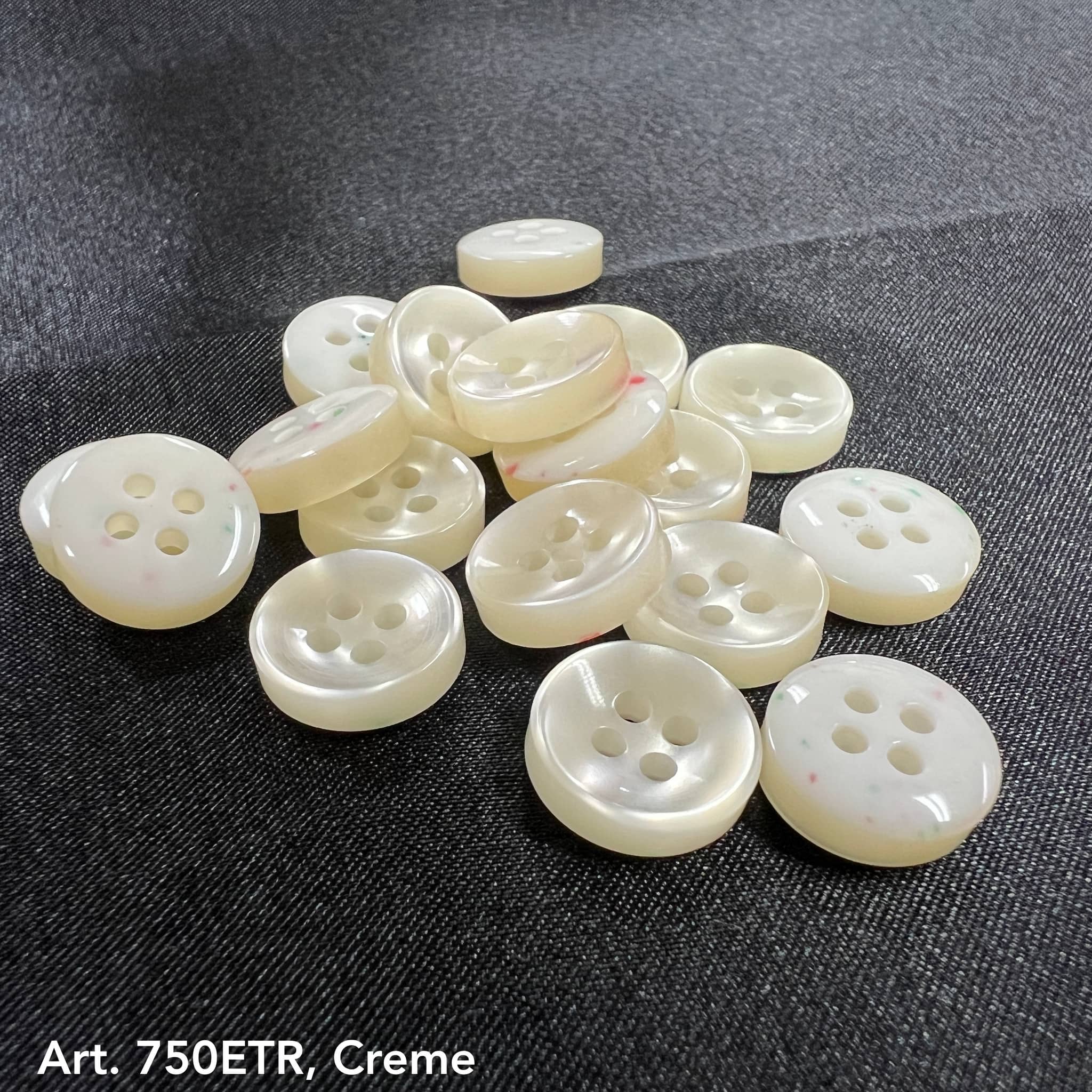 Premium garment buttons for shirts in cream with four holes for secure attachment