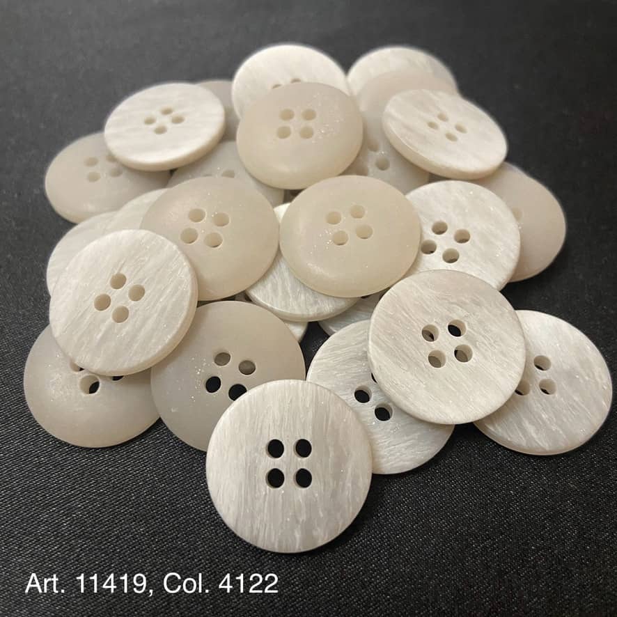 Collection of premium resin buttons for crafts in soft beige with four holes