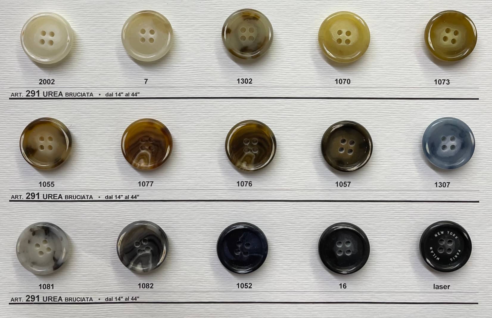 Collection of premium sewing buttons for clothes in various colors and styles from Buttonology Inc.