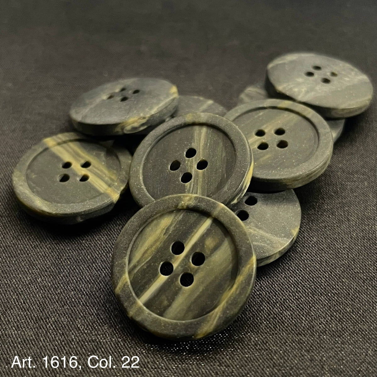 Set of premium sewing buttons for clothing in black and gray marble design with four holes each