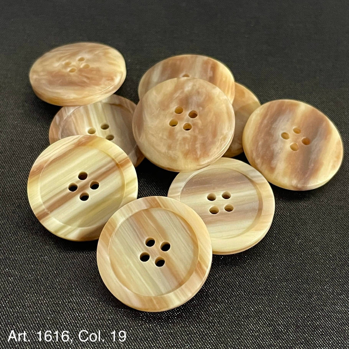 Assorted premium sewing buttons for clothing in natural wood tones with four holes each