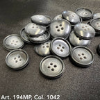 Buttonology Inc premium suit buttons in sleek gray with four holes stacked on black fabric