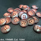 Premium suit buttons by Buttonology Inc scattered on black fabric in brownish shades