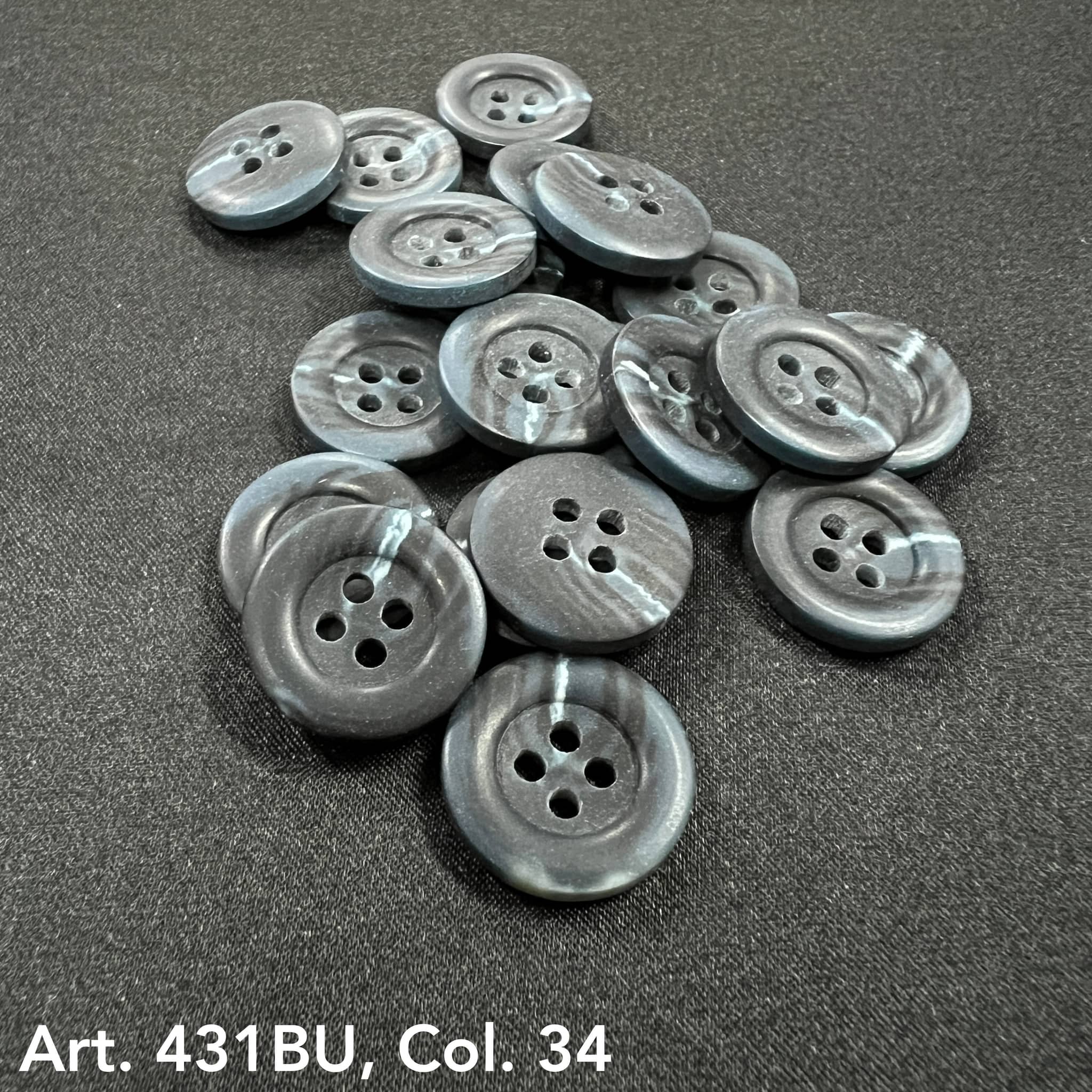 Set of gray marbled sewing buttons for garments featuring four holes for easy attachment