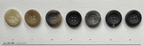 Variety of sewing buttons for garments displayed in different colors and designs