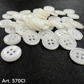 A collection of white sewing buttons with four holes for crafting and garment repairs