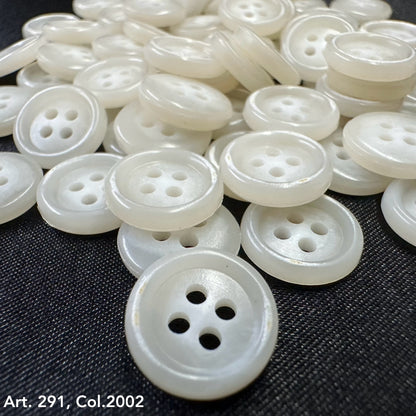 Assortment of Buttonology Inc. white shirting buttons 18L 20L with four holes for sewing projects