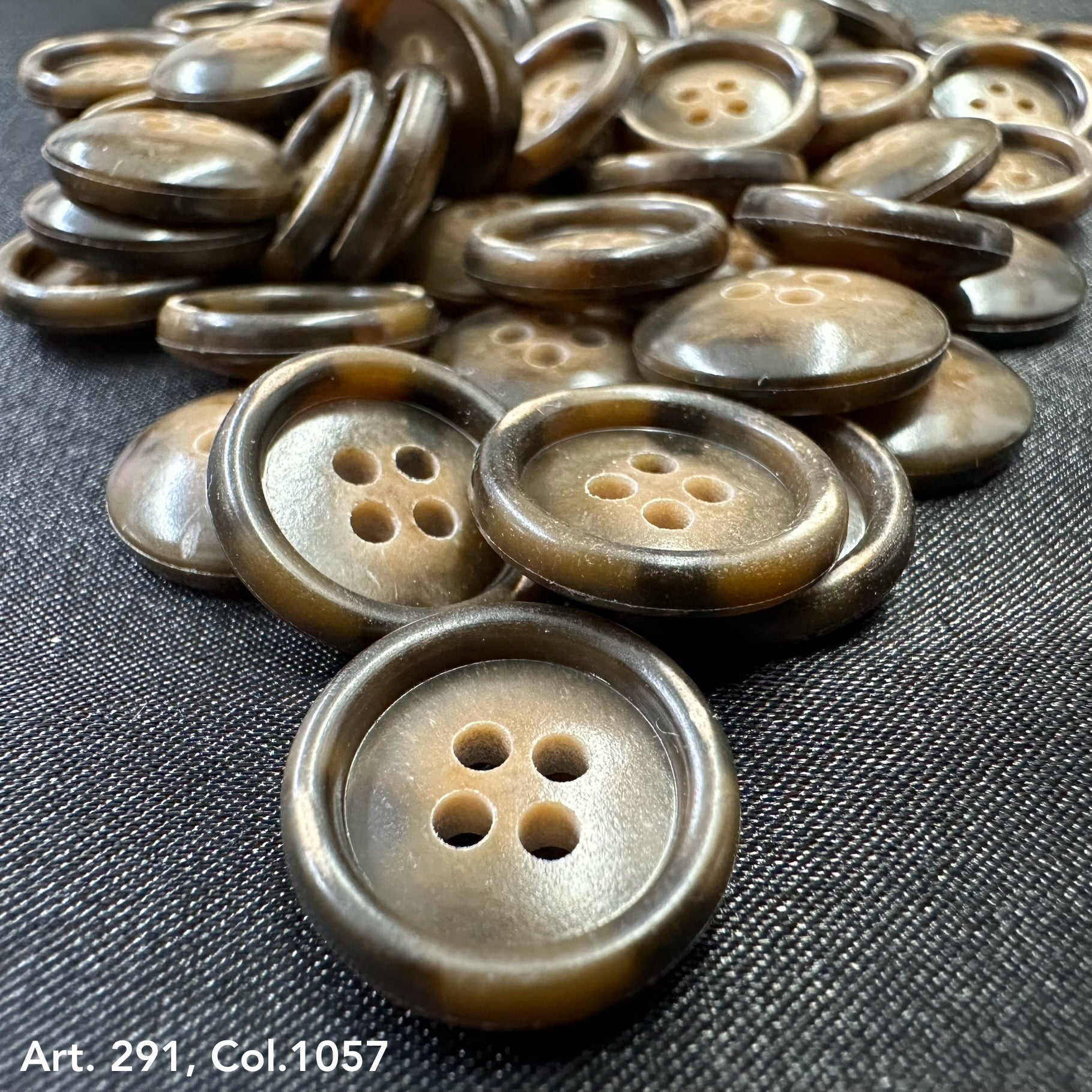 Shirting buttons 18L 20L in a mix of brown colors with four holes for secure stitching