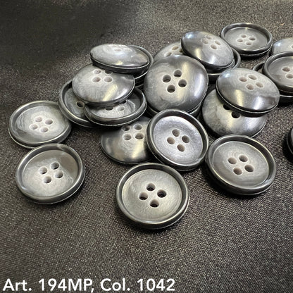 Shirting buttons for dress shirts by Buttonology Inc., featuring a classic dark design and four holes