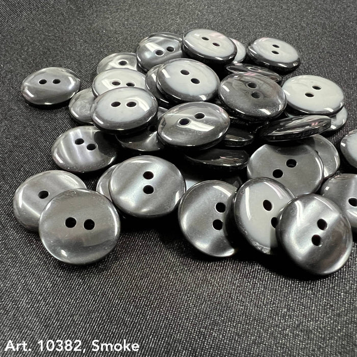 Glossy black and gray smoke design buttons for accessories by Buttonology Inc on dark fabric