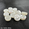 White garment buttons from Buttonology Inc on smoke gray garment buttons background