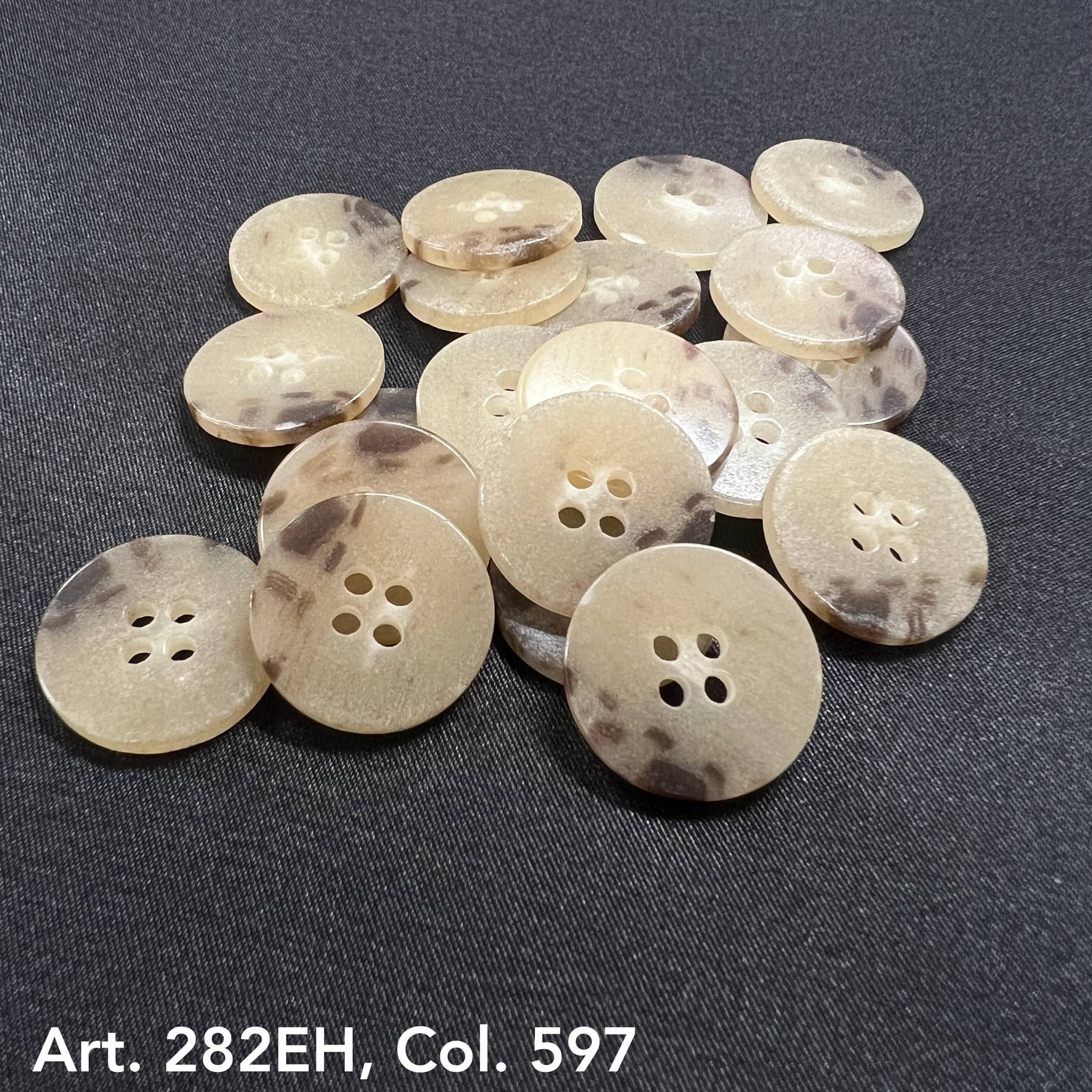 Art. 282EH Col. 597 cream tortoiseshell faux-horn 4-hole buttons, 24L–54L – Buttonology Inc.