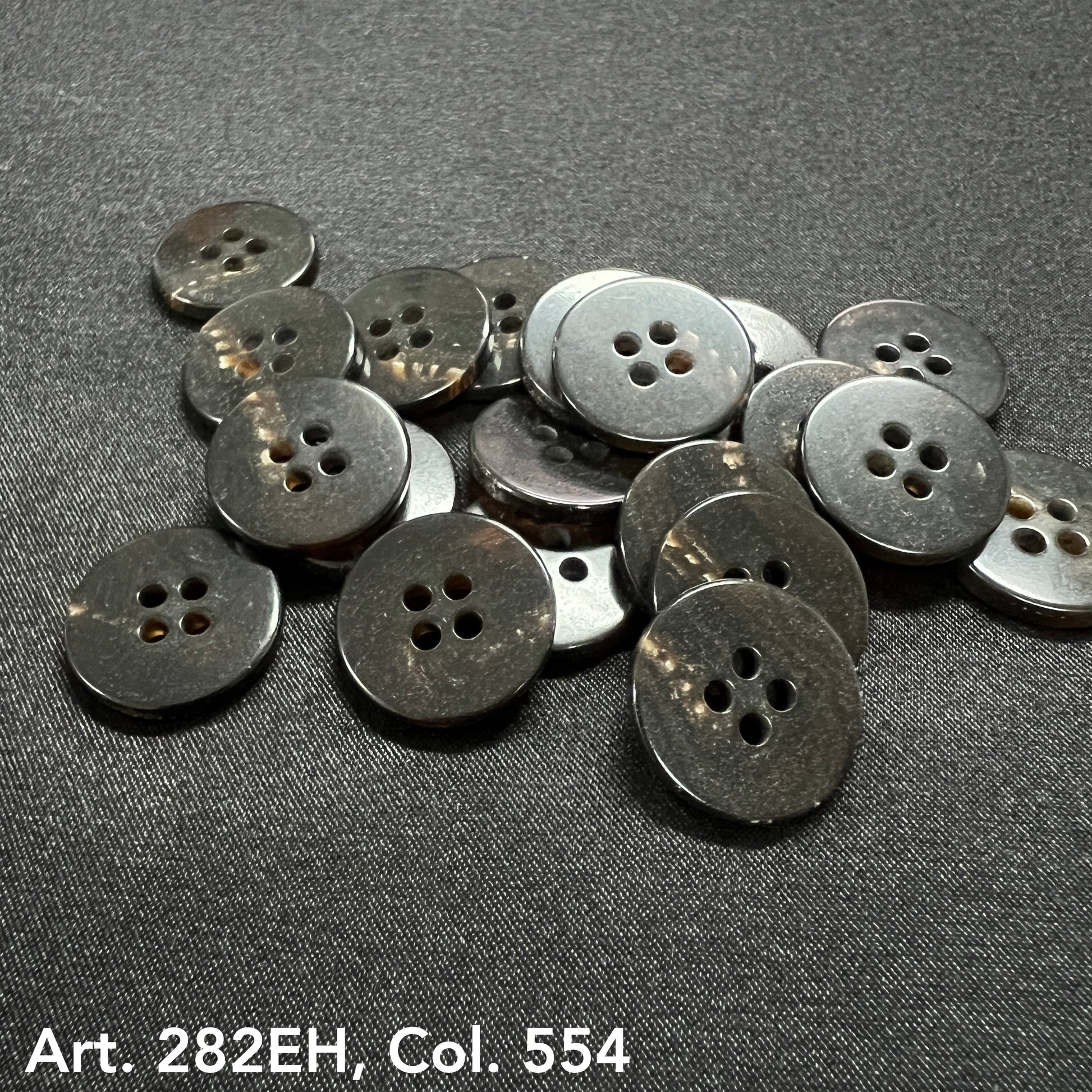 Assorted suit and coat buttons in dark shades, perfect for tailoring and garment repairs