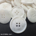 White marbled suiting buttons for garments with four holes for easy sewing and stylish design