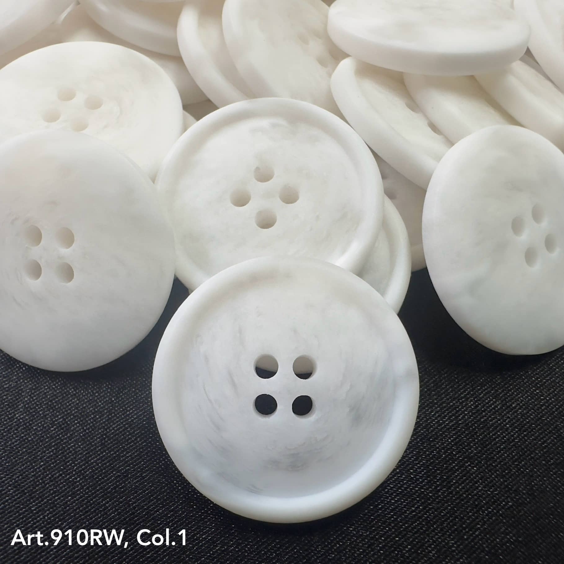 White marbled suiting buttons for garments with four holes for easy sewing and stylish design