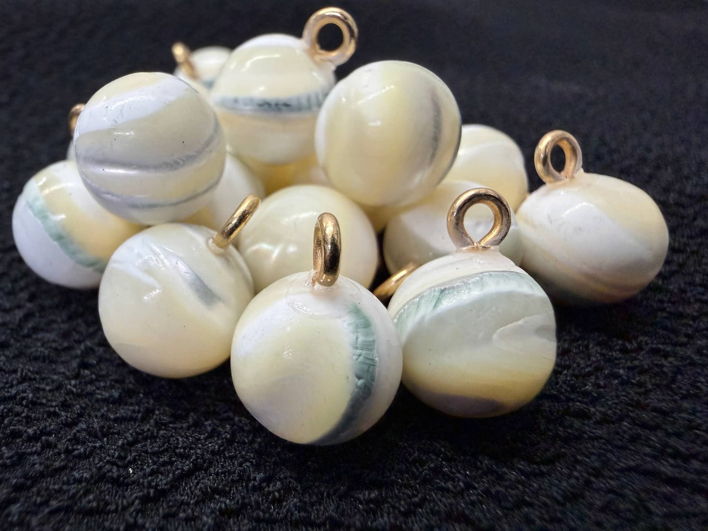 Troca ball shank buttons in creamy yellow and green hues suitable for crafts and sewing projects