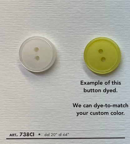 Two white two hole sewing buttons displayed with a dyed example for custom color matching