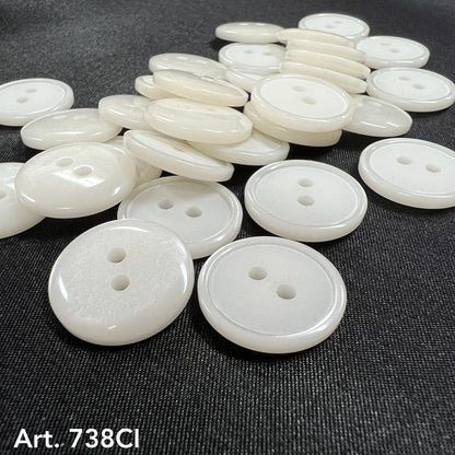 White two hole sewing buttons from Buttonology Inc in various sizes for crafting and garment repair