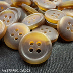 Wholesale four-hole buttons by Buttonology Inc in translucent brown tones on black fabric