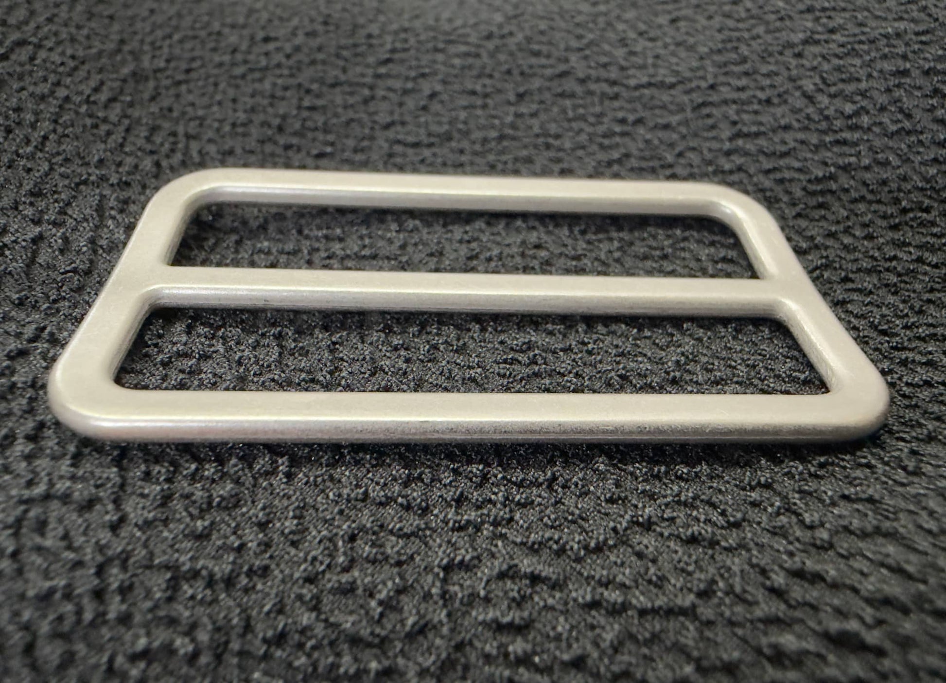 Wide antique silver sliders by Buttonology Inc for creating stylish belts and accessories